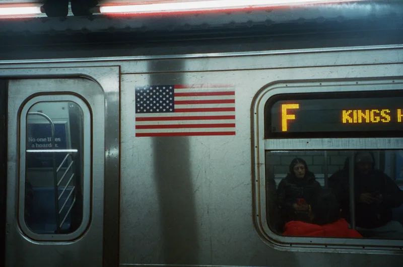 F Train shot on Cinestill 800T with a Canon Sure Shot, by Rich