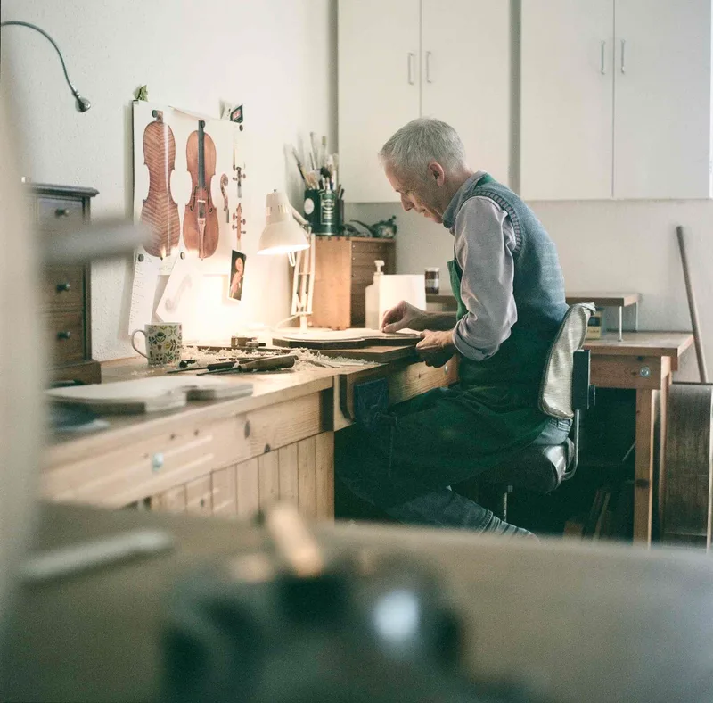 A craftsman at work shot on Fujifilm Provia 100F with a Hasselblad 500CM, developed at AG Photolab, by Rick Davy