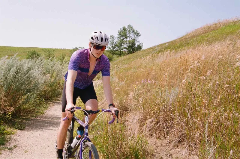 Conn cycling in Saskatchewan shot on Fujifilm FujiColor C200 with a Minolta Dynax 505si, developed at Filmdev, by Marion Guerbet