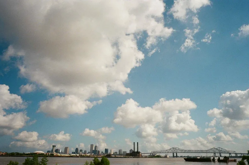 Nola skies shot on Fujifilm Superia X-TRA 400 with a Voigtländer Bessa L, developed at The DarkRoom, by Ray