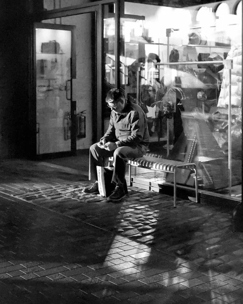 Reflections, frames, light & shadow shot on Street Candy Film ATM 400 with a Minolta CLE, developed at Rapid Eye, by Mark Luke Grant