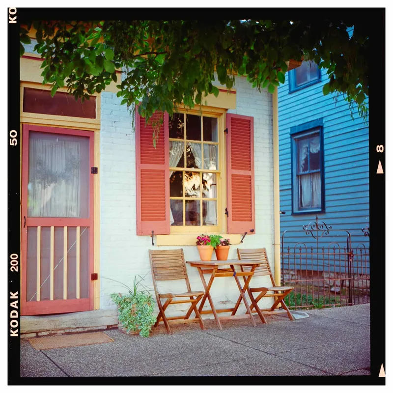 Sidewalk in an old French town shot on Kodak Gold 200 with a Rolleiflex 2.8C, by Justin Thompson