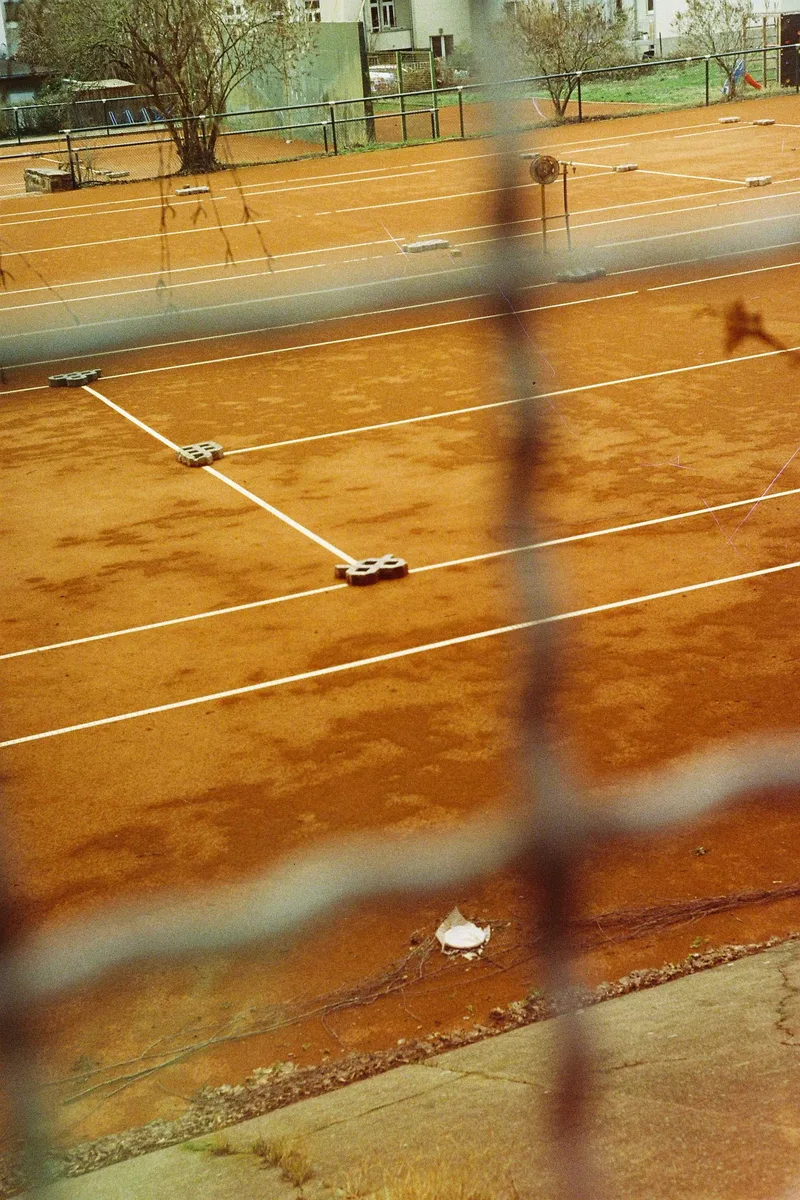 Tennis Court shot on Cinestill 800T with a Zorki 4K, by Nathan