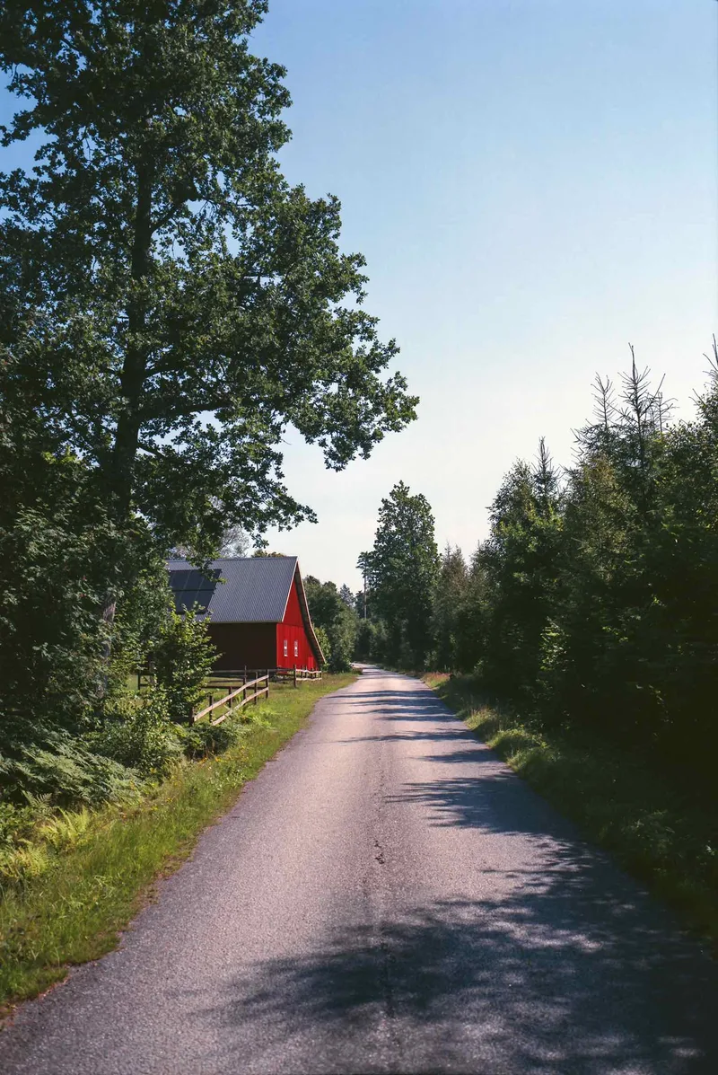 Red house shot on Kodak Ektar 100 with a Fuji GSW690II, by Sven