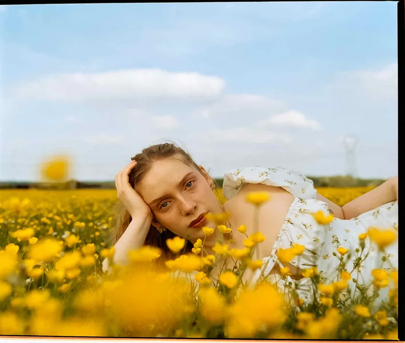 Girlfriend posing nicely shot on Kodak Gold 200 with a Mamiya RB67, by 400grains