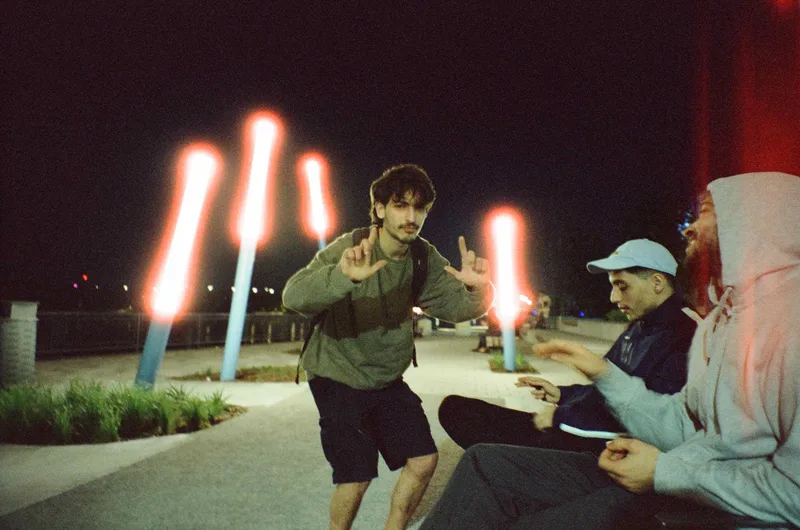 Light sticks shot on Cinestill 800T with a Minolta Freedom Action Zoom, by Wuu