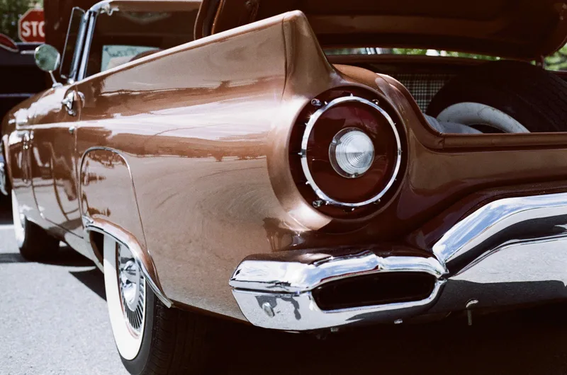 Car show shot on Lomography LomoChrome Metropolis 100 with a Canon AE-1, developed at Bleeker Digital Solutions, by Kim