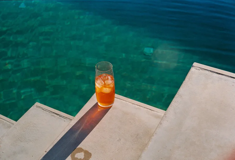 Poolside shot on Kodak Portra 800 with a Mamiya M645 1000s, developed at viertel vor 8, by Alasdair