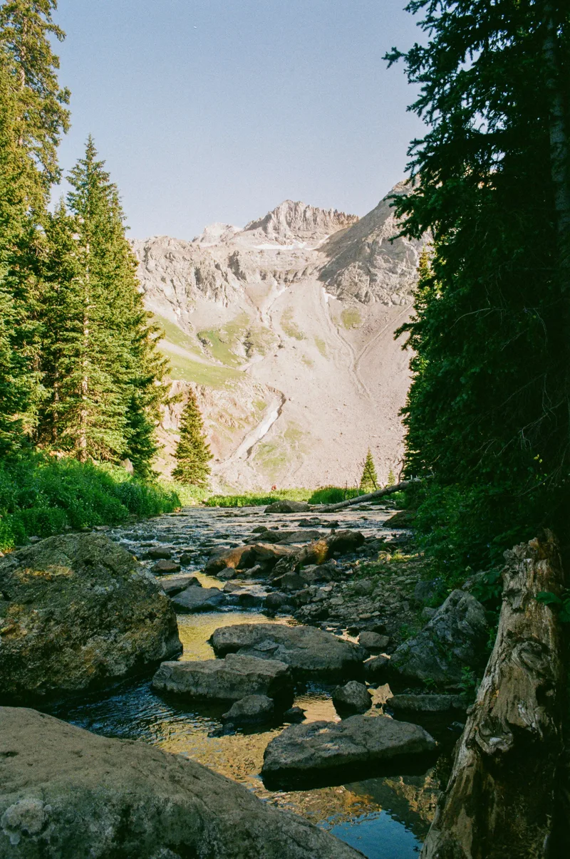 First sight of the alpine lake shot on Kodak Ektar 100 with a Canon F-1, developed at 992 Photo Life, by Chris K.
