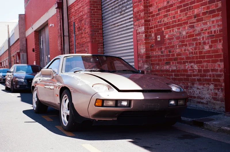 Porche and Brick shot on Kodak Ektar 100 with a Ricoh XR-10M, developed at Hutt Street Photos, by Fox