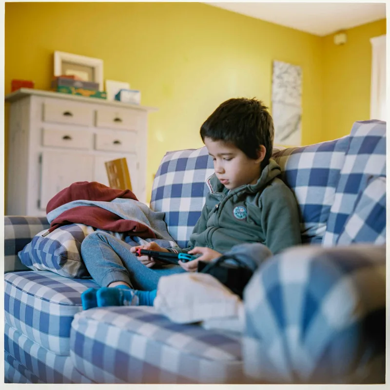 Petit fils shot on Kodak Portra 400 with a Rolleiflex 2.8C, by Alain