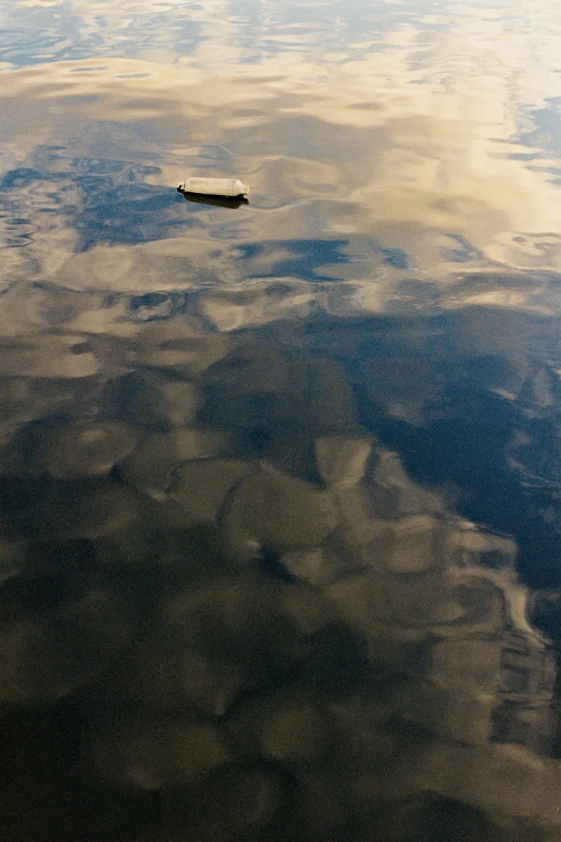 Buoy & Clouds shot on Kodak UltraMax 400 with a Canon A-1, developed at Foto Weckbrodt, by Chillsburg