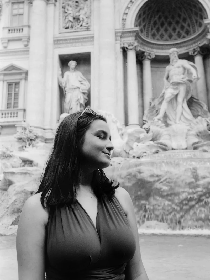 Lady of the fountain shot on Ferrania P30 with a Leica IIIC, developed at Home / Self-Developed, by Cristian Brunelli