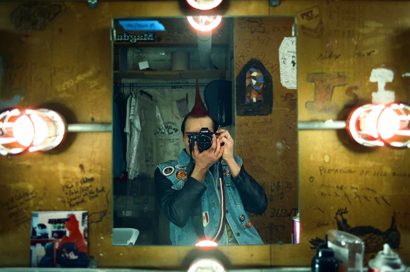 Backstage Self Portrait shot on Cinestill 800T with a Nikon F3 HP, developed at Pacific Photo Lab, by Noah Davis