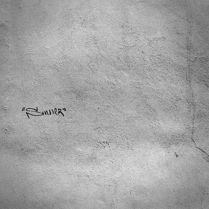 Writing on the Wall shot on Film Photography Project Dracula 64 with a Nikon EM, developed at Home / Self-Developed, by Ryan Jensen