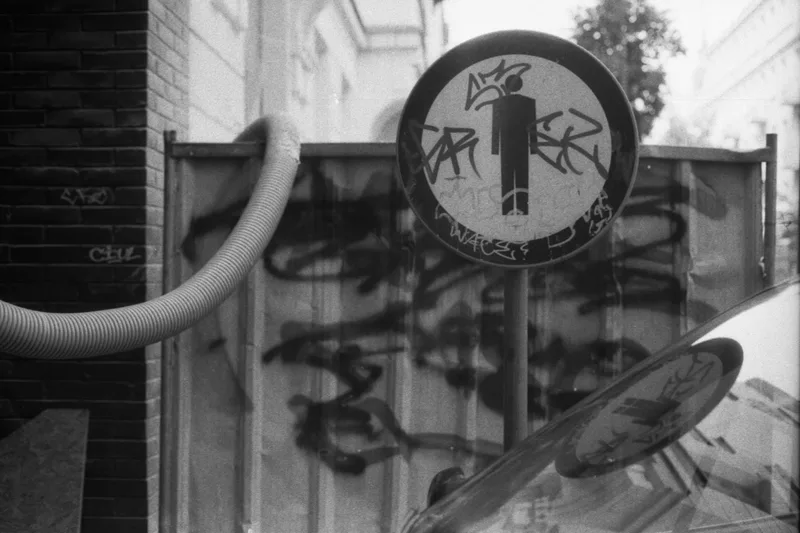 Sign shot on Rollei Blackbird 64 with a Canon AE-1, developed at Home / Self-Developed, by Yevgeniy