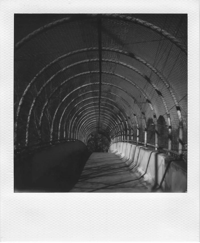 Pedestrian Overpass shot on Polaroid B&W 600 with a Polaroid SX-70 Alpha 1, by Jeremy Kruse