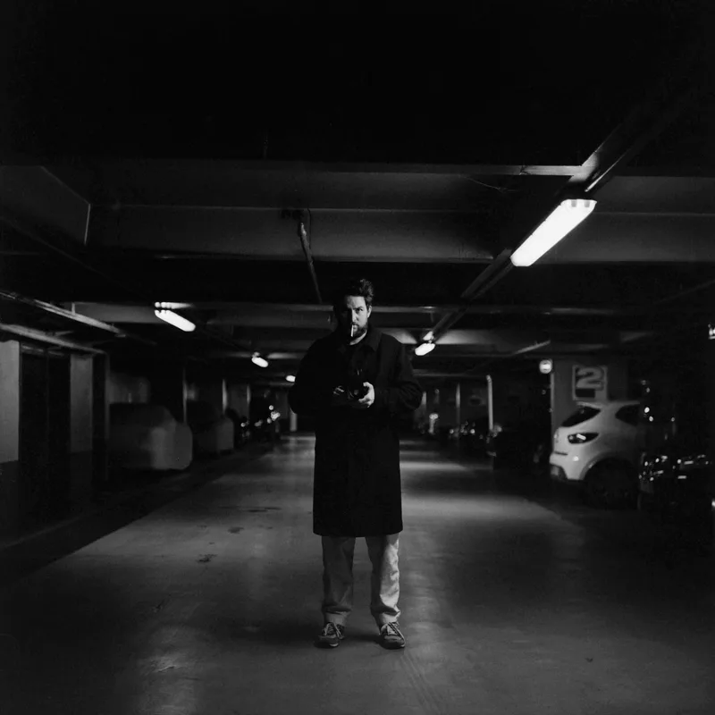 The man with the smoke shot on Ilford HP5 Plus 400 with a Rolleiflex 2.8D, developed at Panajou Bordeaux , by Matthieu Harnois