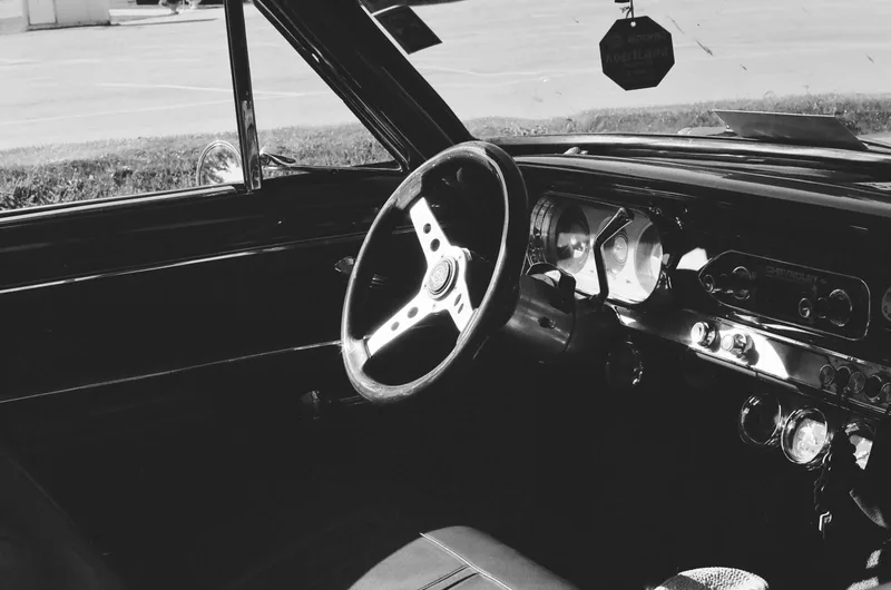 Sunlight on a Dashboard shot on Ilford XP2 Super 400 with a Konica Autoreflex T, by Koda