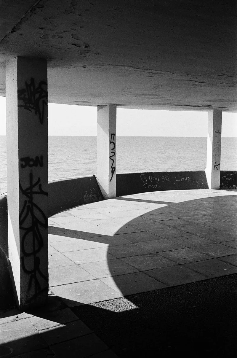 Bottle Alley, St Leonards shot on Ilford HP5 Plus 400 with a Olympus Trip 35, developed at Take It Easy, by Jon