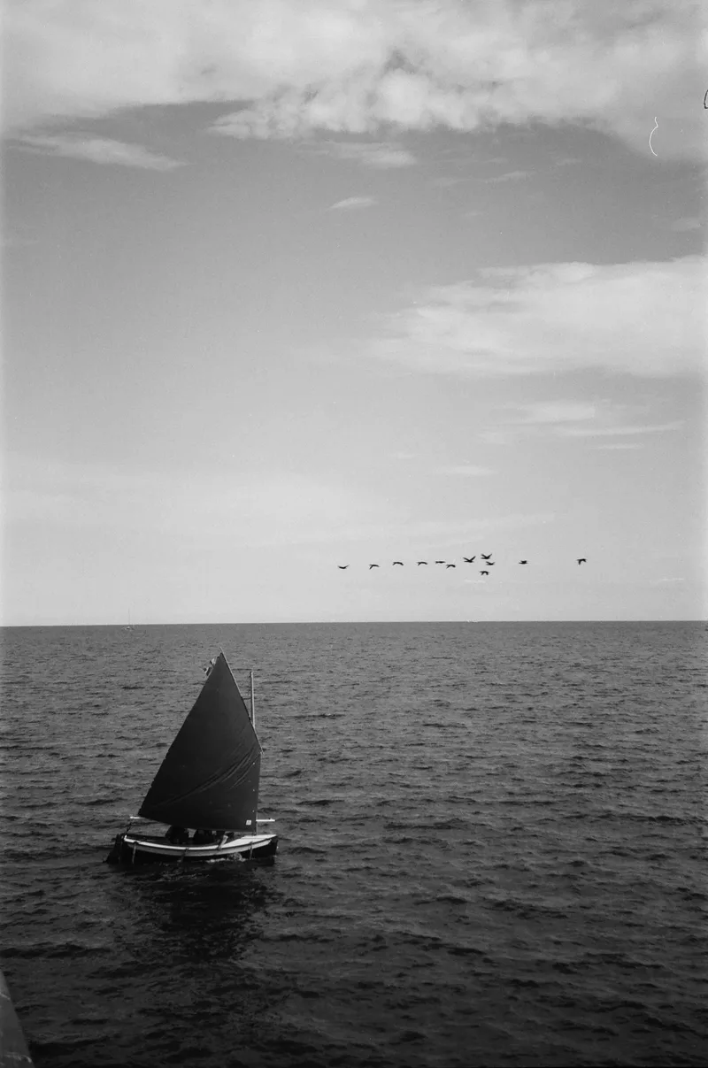 Off to see the World shot on Ilford Delta 400 with a Samsung ECX170, developed at Downtown Camera, by Brad Ball