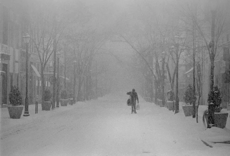 Man in Snowstorm shot on Ilford HP5 Plus 400 with a Olympus OM-4T, by alexonkow