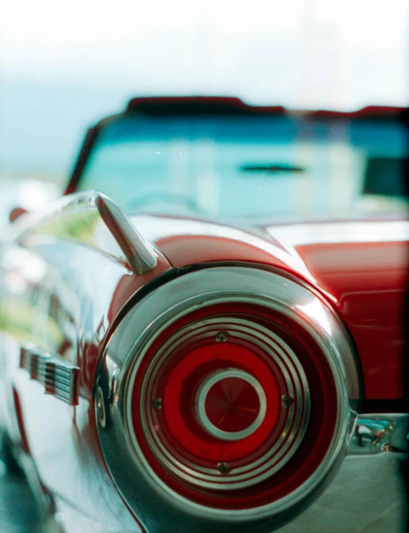 Car meetup shot on Cinestill 400D with a Konica Autorex, by Ariel