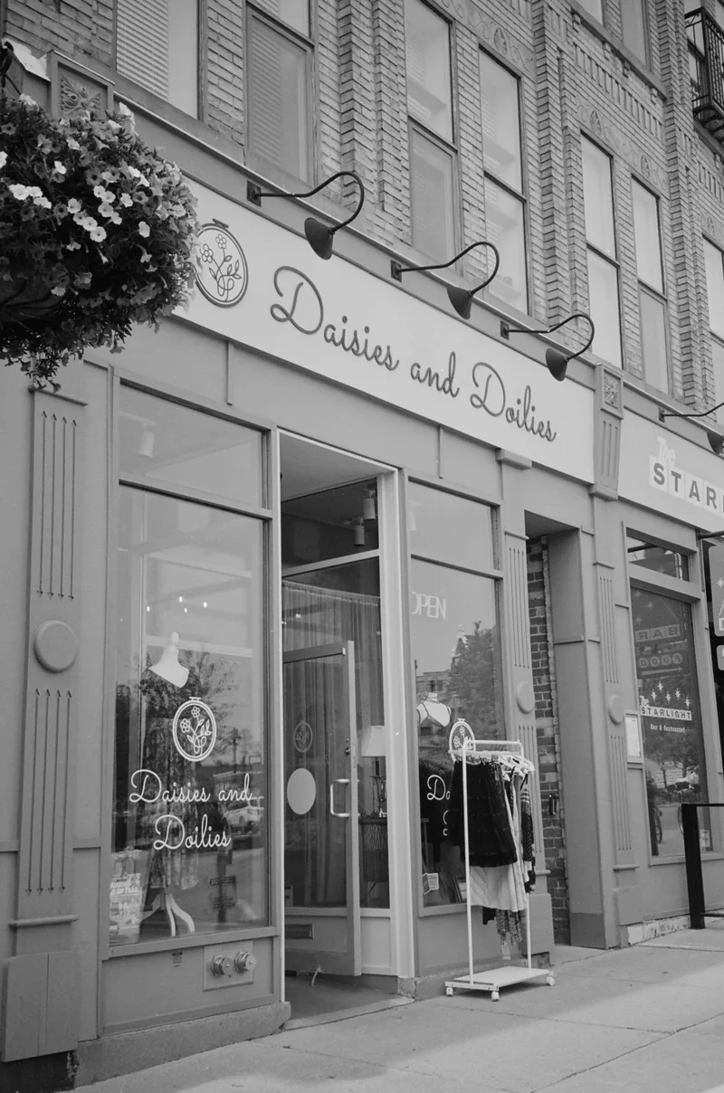 Daisies and Doilies - August 11, 2026 shot on Ilford XP2 Super 400 with a Canon SureShot85, developed at Carman’s Fotosource, by Leela