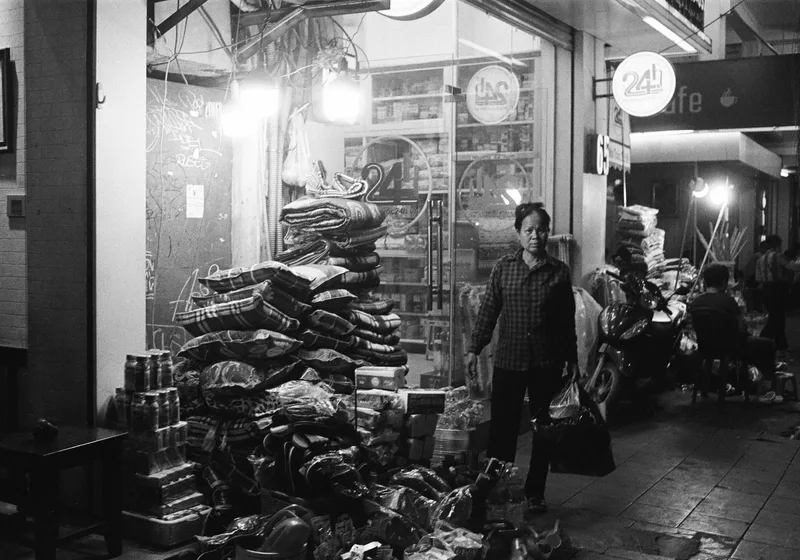 Hanoi at night shot on Ilford HP5 Plus 400 with a Rollei 35, by Nicolai Gjellestad