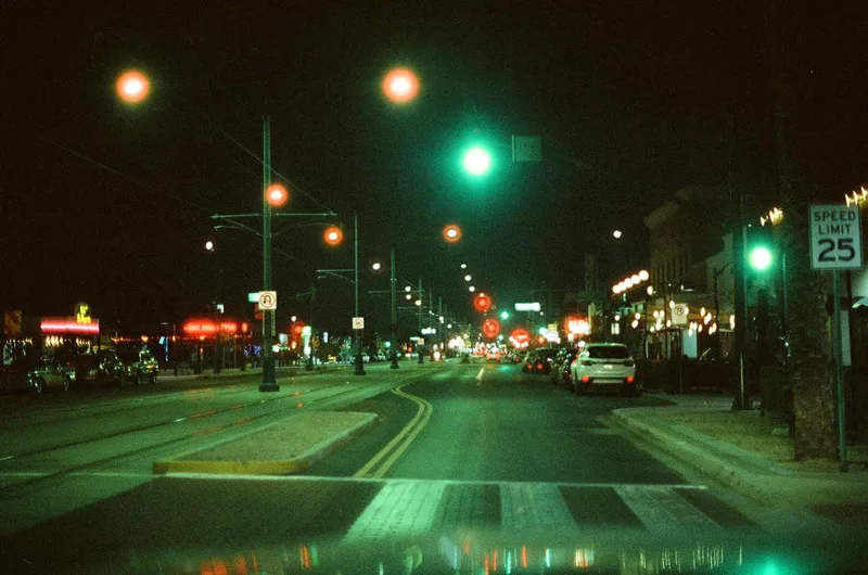 Cruising through the night shot on Cinestill 800T with a Canon AE-1 Program, developed at Strap Film Lab, by Danny