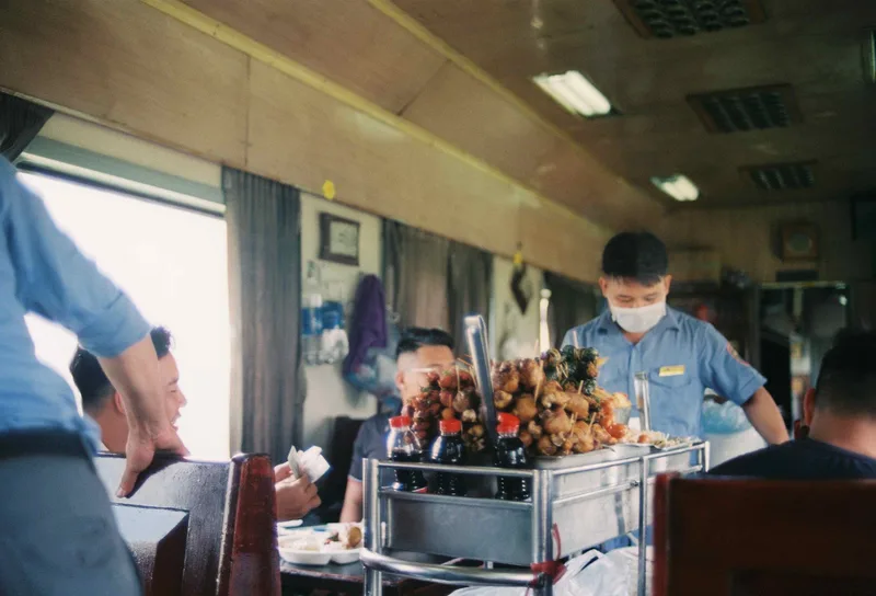 Food cart on a train shot on Agfa Vista Plus 400 with a Nikon FM2n, developed at 47plus minilab, by nivhty123
