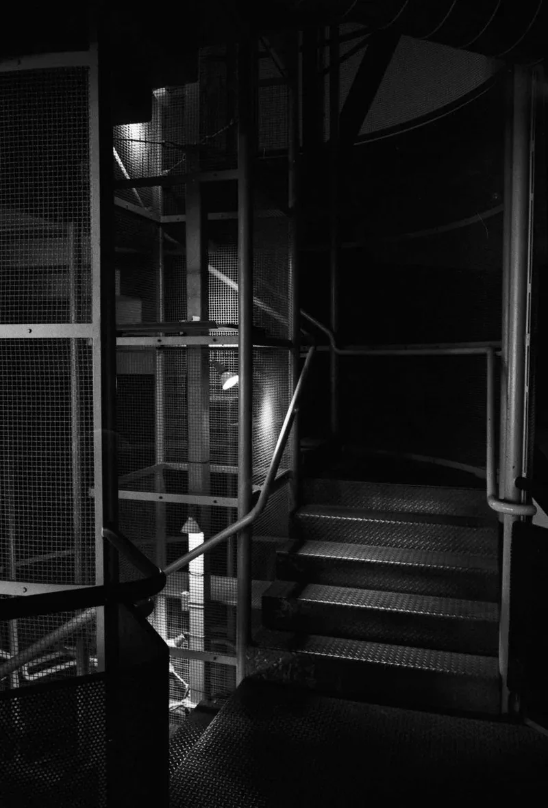 Stairwell shot on Kodak T-Max 400 with a Zeiss IkonZM, developed at Last Good Film Lab, by Mike Ginn