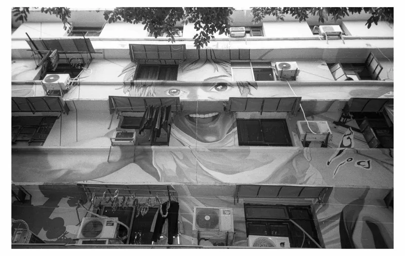 Facade shot on Fujifilm Neopan Acros 100 with a Konica GenbaKantoku28WB, developed at MIRALIGHT, by BadMonkey
