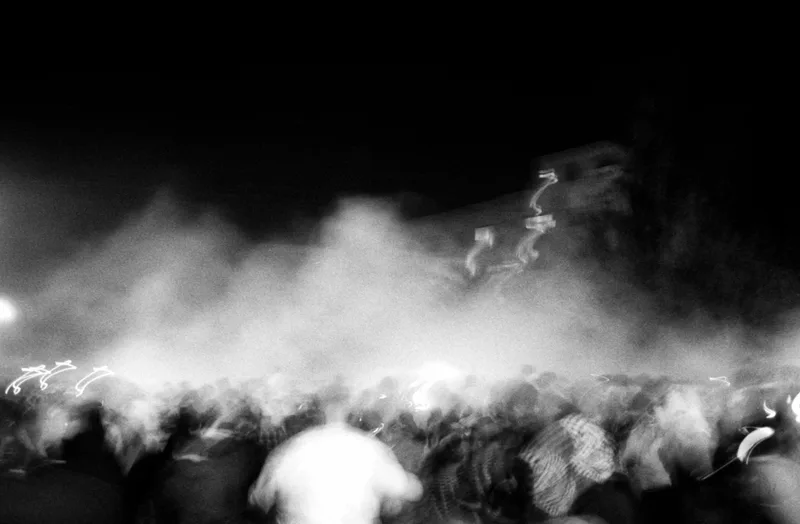 inside the tear gas shot on Ilford Kentmere Pan 400 with a Canon AE-1 Program, developed at Darkroom Amman, by dontblamebaha