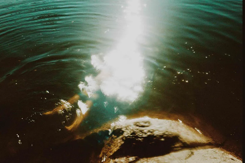Summer shot on Psychedelic Blues 400 #2 with a Nikonos V, developed at Take It Easy, by Chris