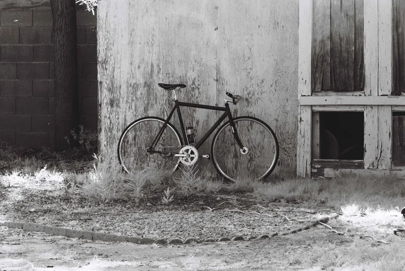 Lo Pro by the shed shot on Rollei Infrared 400 with a Minolta SR-T 201, by Vomitvomitvomitvomit