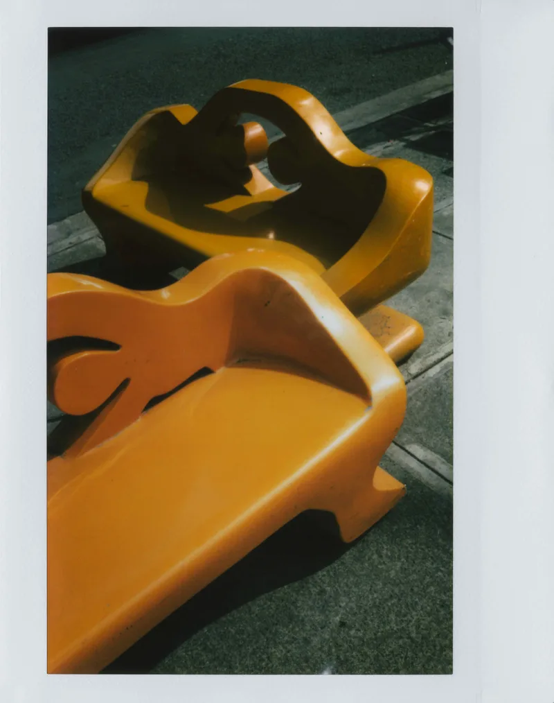 orange shot on Fujifilm Instax Wide with a Fujifilm Instax Wide 300, by lianne