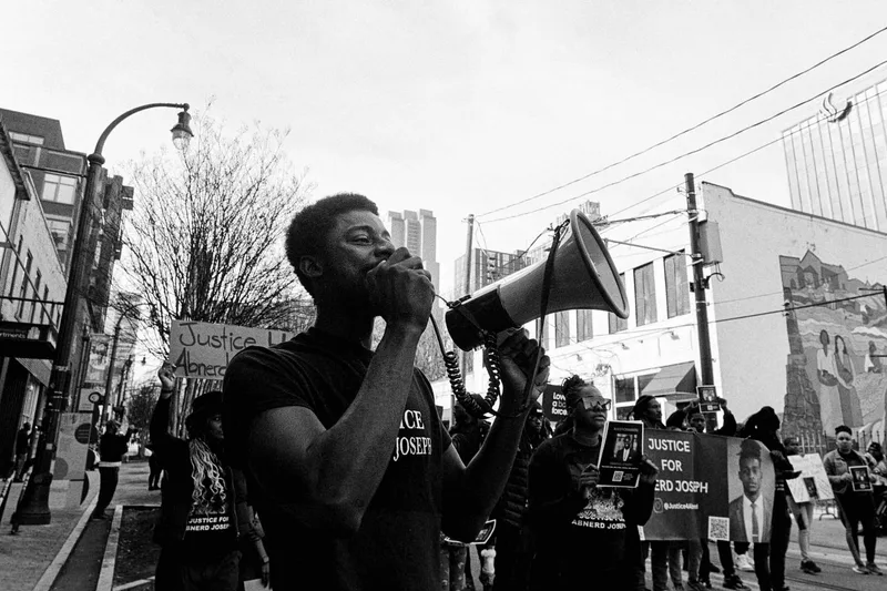 Wide Angle Moments from MLK Day March 2024 - 2 shot on Ilford HP5 Plus 400 with a Voigtländer Bessa R4A, developed at Home / Self-Developed, by Richard Vialet, ASC