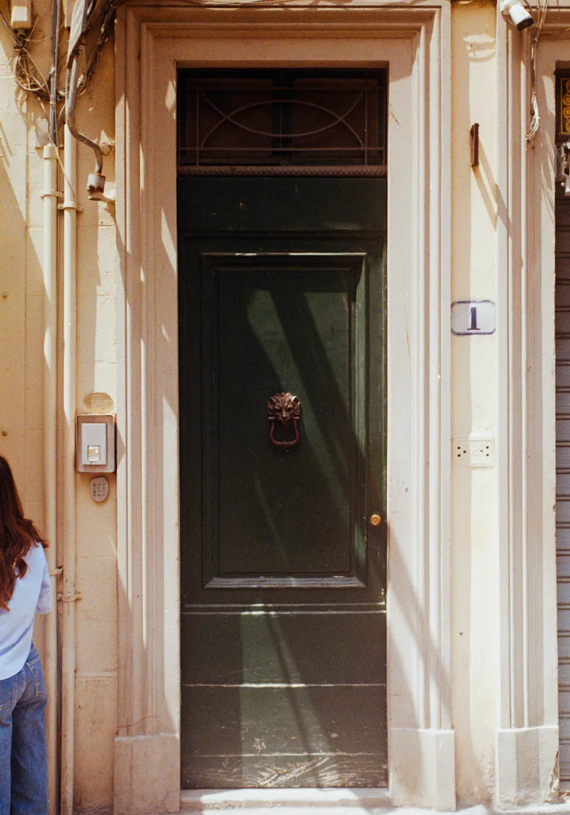 Green Door in Florence shot on Kodak KodaColor 100 with a Minolta X-700, developed at Home / Self-Developed, by Corbin