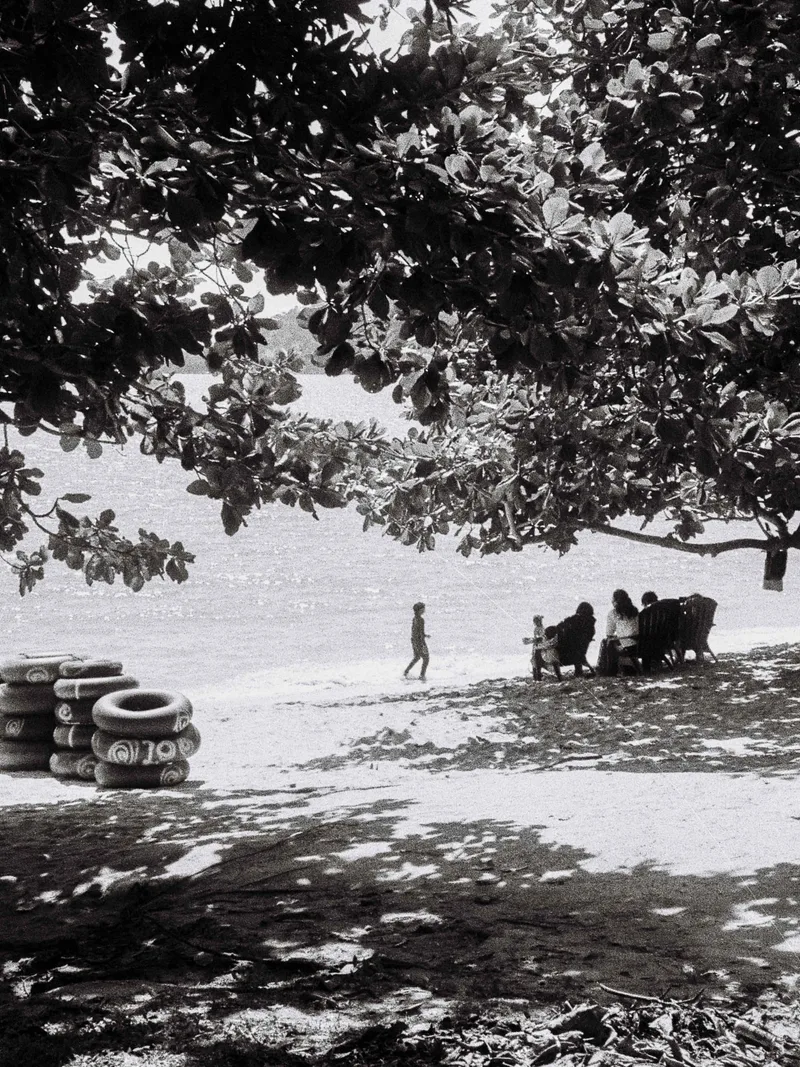 A day at the beach shot on Rollei RPX 100 with a Canon Prima Zoom Shot, developed at Home / Self-Developed, by Kram