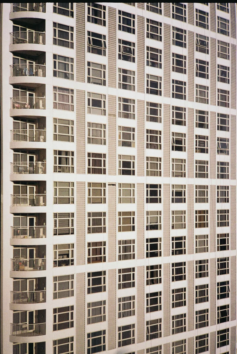 neighbors shot on Kodak Gold 200 with a Canon EOS 100, developed at Wonder Photo Shop by Fujifilm, by lianne