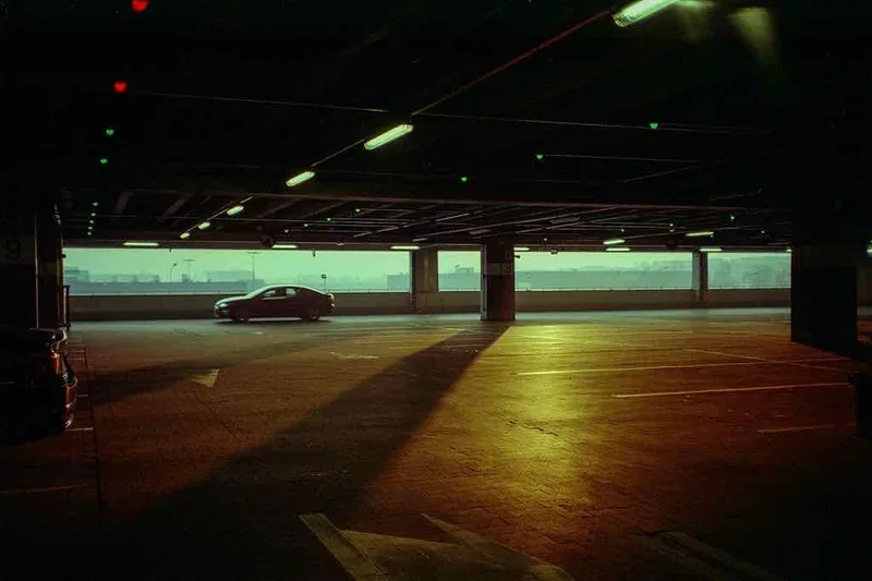 Shopping parking in Kraków shot on Fujifilm FujiColor C100 with a Canon MC, by Kamil Kowalkowski