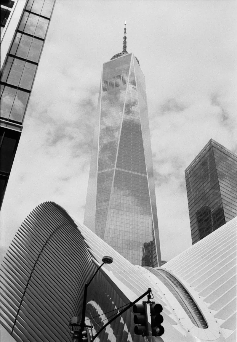 Freedom Tower Clouds shot on Kodak Tri-X 400 with a Nikon S32000Edition, developed at Home / Self-Developed, by Anthony