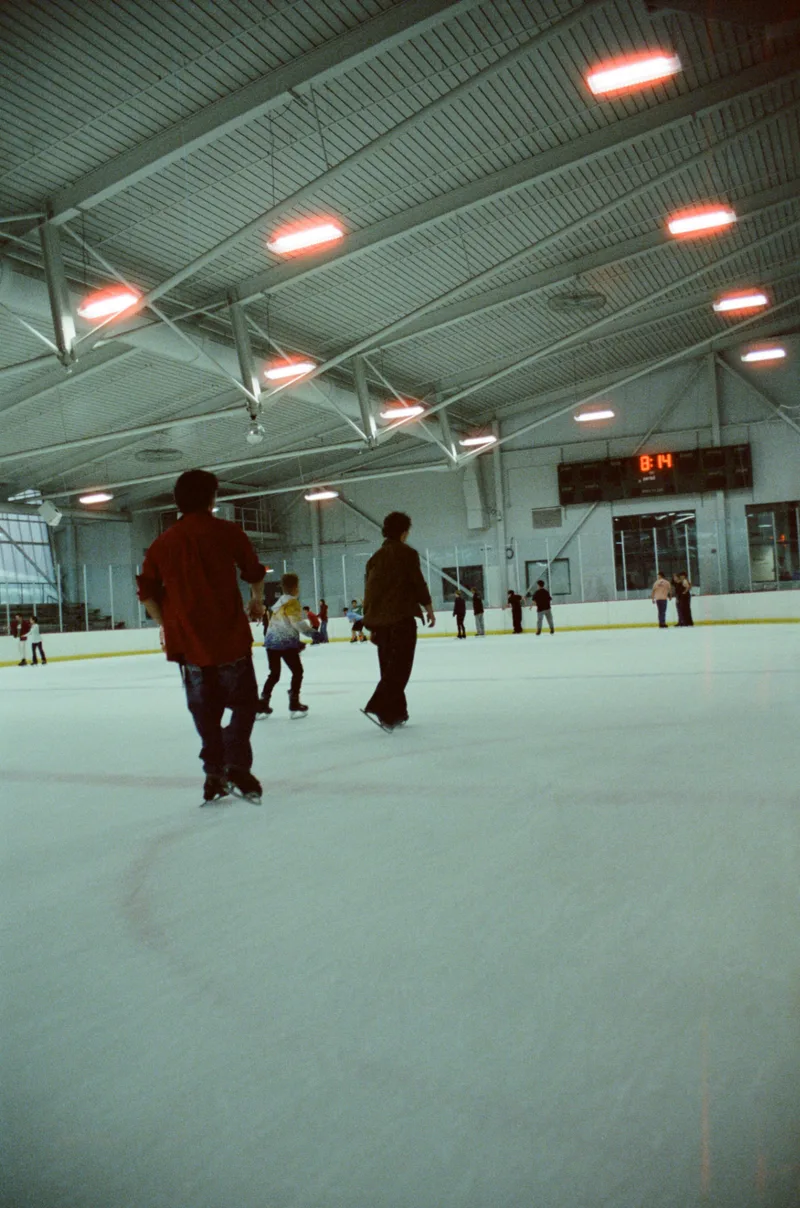After-convention ice rink visit shot on Cinestill 800T with a Canon EOS Rebel Ti, developed at State Film Lab, by Mathai Karanja