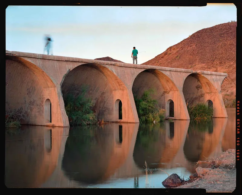Man Fishing at Gillespie Dam shot on Kodak Ektar 100 with a Wista VX