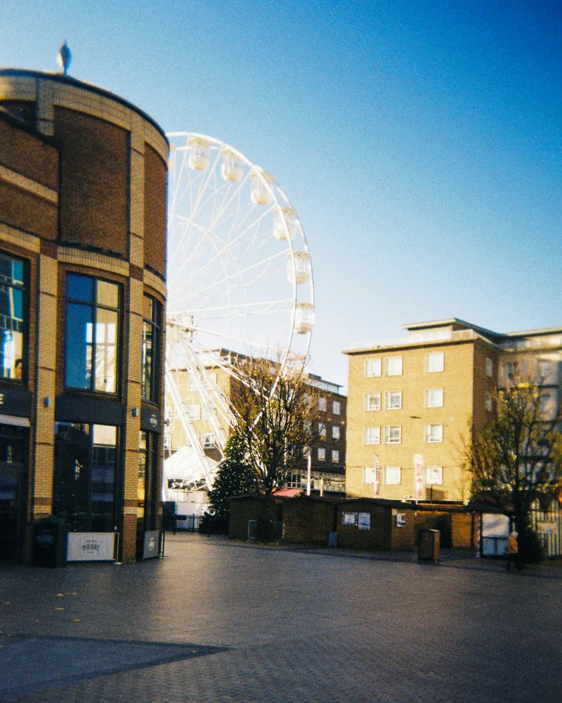 Coventry’s wheel shot on Kodak Gold 200 with a Olympus Trip 35, developed at Harman Lab, by Andy Hawthorne