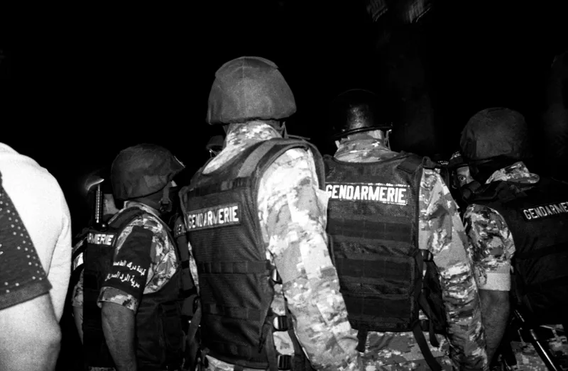 police shot on Ilford Kentmere Pan 400 with a Canon AE-1 Program, developed at Darkroom Amman, by dontblamebaha