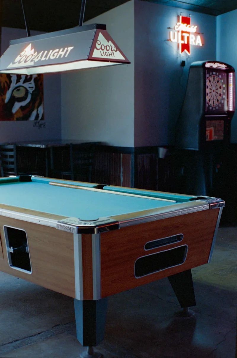 Pool at the Pizza Pub shot on Cinestill 800T with a Canon Rebel G, by Shane