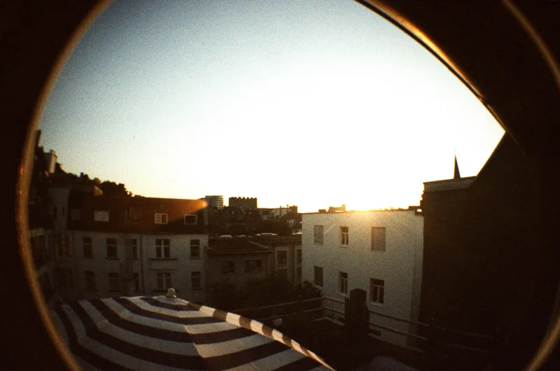 KÖLN SÜD SUNSET shot on Agfa Color 400 with a Lomography Fisheye, by oli-bon