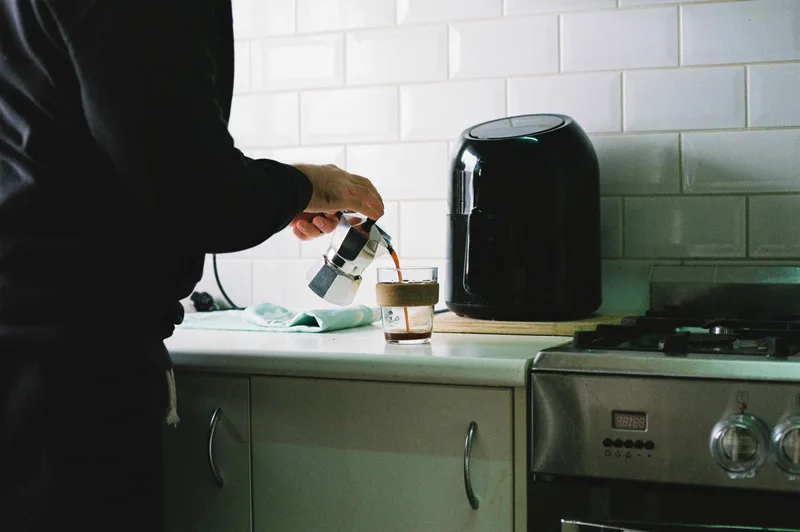 Morning coffee shot on Kodak UltraMax 400 with a Canon 650, by JS